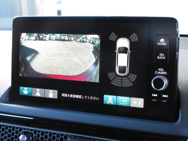 シビック ｅ：ＨＥＶ　ホンダセンシングホンダコネクトディスプレイＢｌｕｅｔｏｏｔｈＥＴＣＲカメラワンオーナー　盗難防止システム　クリアランスソナー　オートクルーズコントロール　地デジフルセグ　後カメラ　１オーナー車　記録簿（5枚目）