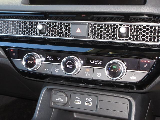 シビック ｅ：ＨＥＶ　ホンダセンシングホンダコネクトディスプレイＢｌｕｅｔｏｏｔｈＥＴＣＲカメラワンオーナー　盗難防止システム　クリアランスソナー　オートクルーズコントロール　地デジフルセグ　後カメラ　１オーナー車　記録簿（14枚目）