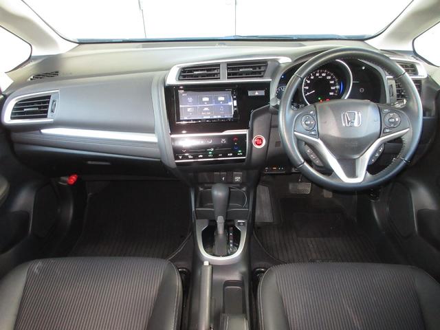 フィット 15XLホンダセンシング ワンオーナー 禁煙 1年保証 車検整備付 メモリーナビ フルセグTV CD&DVD再生 BTオーディオ接続 サイドカーテンエアバッグ リアカメラ ETC 追随型クルーズコントロール 15インチアルミ(8枚目)