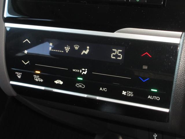 フィット 15XLホンダセンシング ワンオーナー 禁煙 1年保証 車検整備付 メモリーナビ フルセグTV CD&DVD再生 BTオーディオ接続 サイドカーテンエアバッグ リアカメラ ETC 追随型クルーズコントロール 15インチアルミ(13枚目)