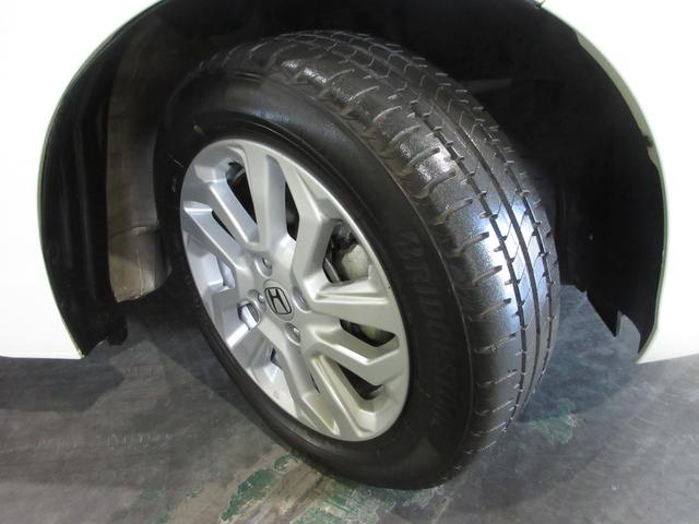 フィット 15XLホンダセンシング ワンオーナー 禁煙 1年保証 車検整備付 メモリーナビ フルセグTV CD&DVD再生 BTオーディオ接続 サイドカーテンエアバッグ リアカメラ ETC 追随型クルーズコントロール 15インチアルミ(19枚目)