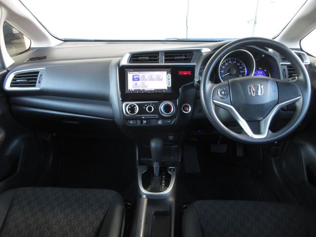 フィット 13G・Fパッケージ この車両は未加修現状販売「そのまんま車」になります。傷や凹み・内装を現状にて展示しております。詳しくはスタッフにお問い合わせください。ナビ バックカメラ ワンオーナー 禁煙車 当社点検パック実施済(17枚目)