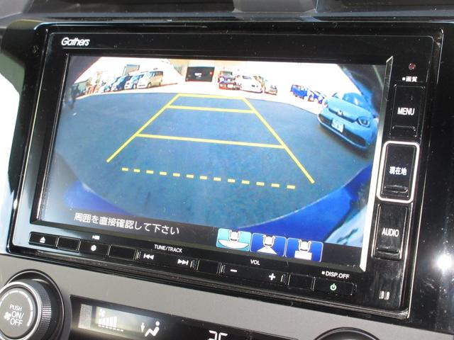 シビック ハッチバック ホンダセンシング純正メモリーナビBluetoothドラレコETCRカメラワンオーナー 追突軽減ブレーキ 盗難防止装置 本革シート 1オーナー Bモニター 整備記録簿 横滑防止 シートヒーター付き(9枚目)