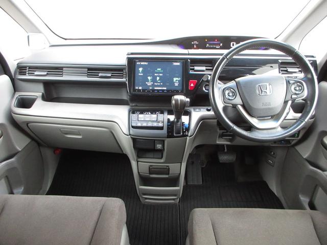 ステップワゴン G ホンダセンシング純正9インチメモリーナビBluetoothETCRカメラ 整備記録簿 LEDライト ETC車載器 地デジTV ナビTV バックガイドモニター オートクルーズコントロール 横滑防止(9枚目)