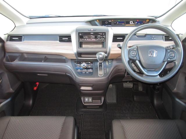 フリード G・ホンダセンシング 2年保証(距離無制限) 禁煙車 前席シートヒーター 両側電動スライドドア ドアバイザー 点検記録簿 CDチューナー ETC ワンオーナースマートキー LEDヘッドライト クルコン(7枚目)