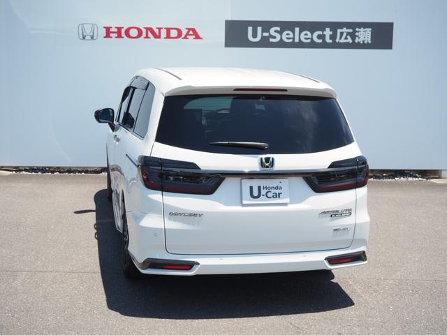 オデッセイハイブリッド ｅ：ＨＥＶアブソルート・ＥＸブラックエディション　ホンダセンシング　純正１１．４ＩＮナビ　マルチビューカメラ　２．０ＥＴＣ　ＦＲドラレコ　障害物センサー　革シート　ＰＷシート　オットマン　シートヒーター　ＰＷゲート　アルミホイール　ＬＥＤライト（12枚目）