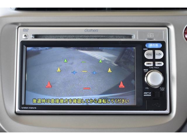 フィットハイブリッド ベースグレード　純正ナビ　ワンセグ　Ｒカメラ　ＥＴＣ　ＷエアＢ　キーレスキー　整備記録簿　パワーウィンドウ　クルコン　ＤＶＤ再生　エアコン　Ｂカメ　ＵＳＢポート　ＡＢＳ　ナビＴＶ　運転席エアバック　パワステ（3枚目）
