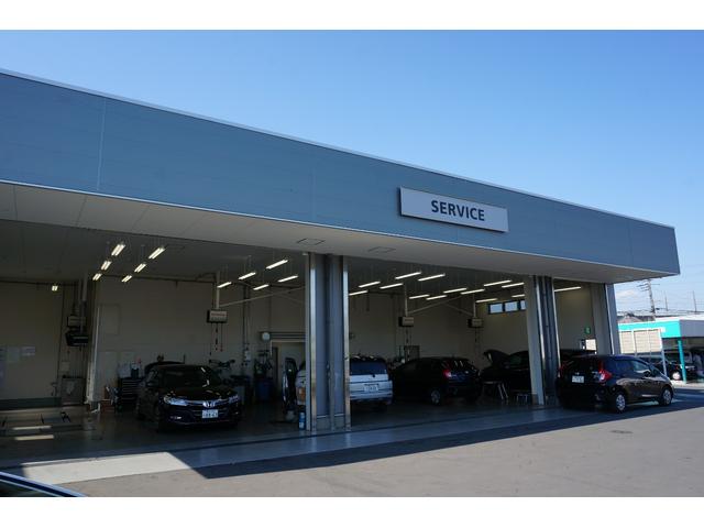 フィットハイブリッド ベースグレード　純正ナビ　ワンセグ　Ｒカメラ　ＥＴＣ　ＷエアＢ　キーレスキー　整備記録簿　パワーウィンドウ　クルコン　ＤＶＤ再生　エアコン　Ｂカメ　ＵＳＢポート　ＡＢＳ　ナビＴＶ　運転席エアバック　パワステ（49枚目）