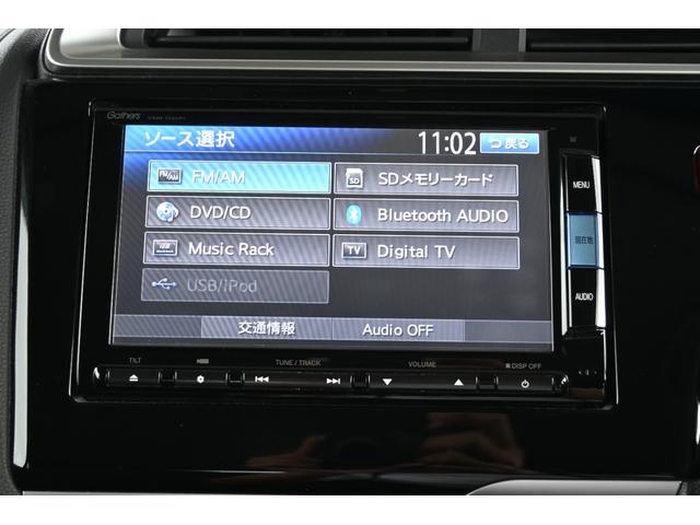 フィットハイブリッド Ｆパッケージ　純正ナビ　フルセグ　Ｒカメラ　アルミホイール（社外）　地デジＴＶ　盗難警報装置　ワンオ－ナ－車　記録簿有り　ＡＵＴＯエアコン　カーテンエアバック　助手席エアバック　ＥＣＯＮ　リヤカメラ　ＡＢＳ付（2枚目）