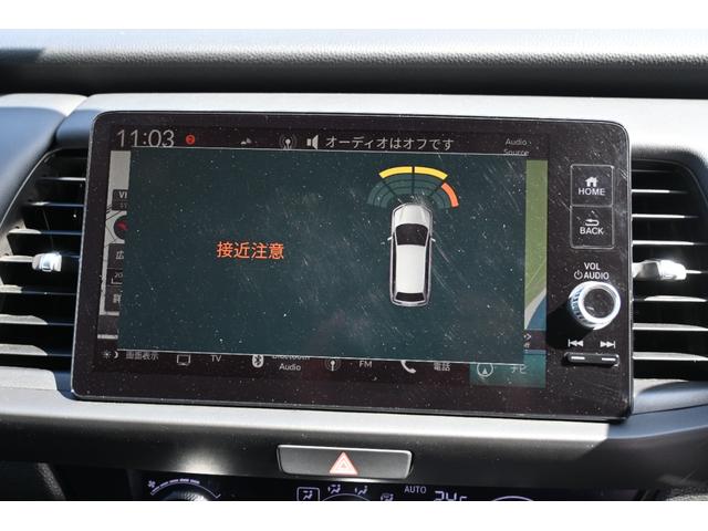 フィット ｅ：ＨＥＶクロスター　ホンダセンシング　ホンダコネクトディスプレイナビ　Ｒカメラ　２．０ＥＴＣ　ＦＲドラレコ　障害物センサー　アルミホイール　ＬＥＤライト　衝突回避システム　１オーナー　フルオートエアコン　整備記録簿（4枚目）