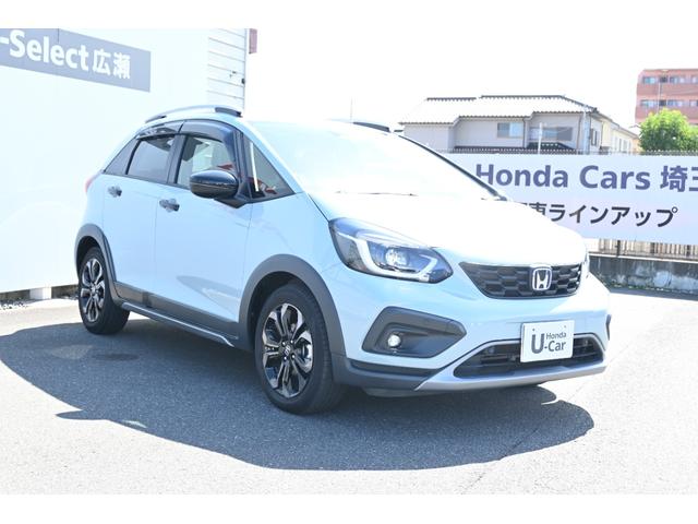 フィット ｅ：ＨＥＶクロスター　ホンダセンシング　ホンダコネクトディスプレイナビ　Ｒカメラ　２．０ＥＴＣ　ＦＲドラレコ　障害物センサー　アルミホイール　ＬＥＤライト　衝突回避システム　１オーナー　フルオートエアコン　整備記録簿（6枚目）