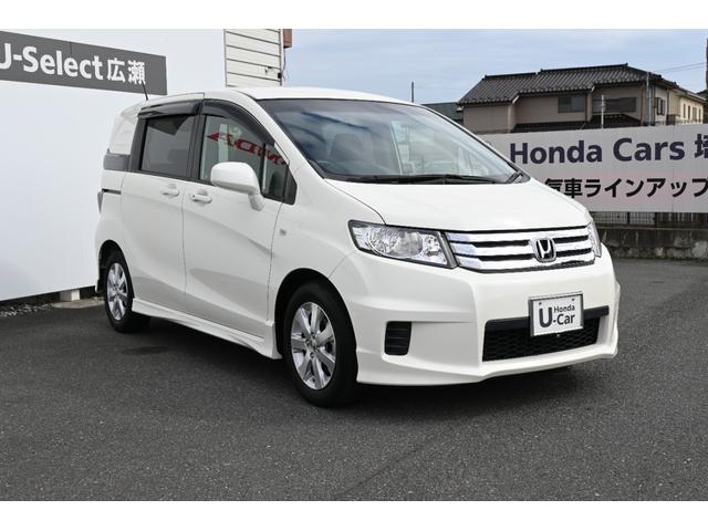 フリードスパイク Ｇエアロ　雹害現状車　純正ナビ　ワンセグ　ＦＲカメラ　ＥＴＣ　アルミホイール　ＨＩＤライト　左ＰＷスライドドア　１オーナー車　インテリキー　Ｂカメ　キーレス　ナビＴＶ　整備記録簿　助手席エアバッグ　ＡＡＣ（6枚目）