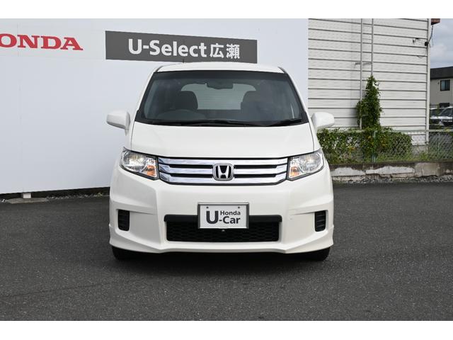フリードスパイク Ｇエアロ　雹害現状車　純正ナビ　ワンセグ　ＦＲカメラ　ＥＴＣ　アルミホイール　ＨＩＤライト　左ＰＷスライドドア　１オーナー車　インテリキー　Ｂカメ　キーレス　ナビＴＶ　整備記録簿　助手席エアバッグ　ＡＡＣ（7枚目）
