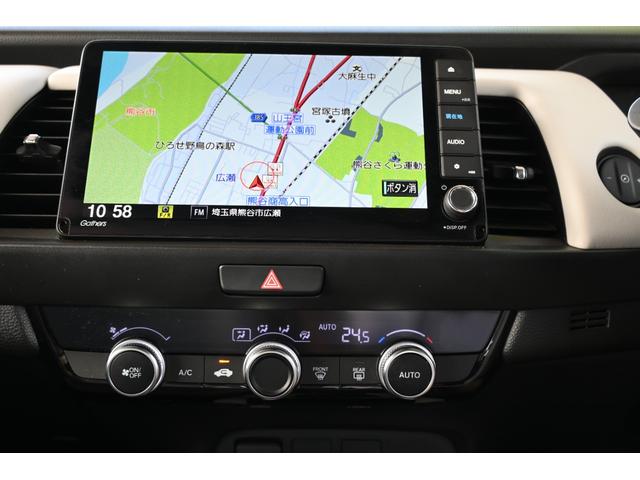 フィット ホーム ホンダセンシング 純正9INナビ Rカメラ ETC FRドラレコ 障害物センサー LEDライト 衝突軽減ブレーキ ワンオーナー リアカメ クリアランスソナー フルセグTV 記録簿付 エアバッグ DVD(14枚目)