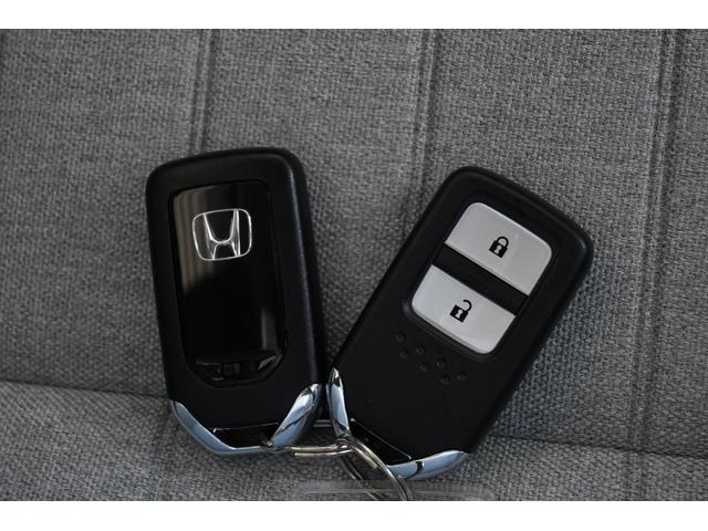 フィット ホーム ホンダセンシング 純正9INナビ Rカメラ ETC FRドラレコ 障害物センサー LEDライト 衝突軽減ブレーキ ワンオーナー リアカメ クリアランスソナー フルセグTV 記録簿付 エアバッグ DVD(16枚目)