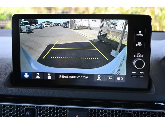 シビック e:HEVEX ホンダセンシング ホンダコネクトディスプレイナビ Rカメラ 2.0ETC FRドラレコ 障害物センサー PWシート シートヒーター アルミホイール LEDライト パノラミックサンルーフ 当社業務車(3枚目)