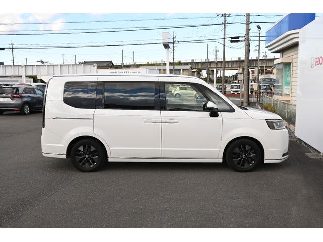 ステップワゴン e:HEVスパーダ ホンダセンシング 純正11.4INナビ Rカメラ 2.0ETC 障害物センサー シートヒーター オットマン PWゲート アルミホイール LEDライト 両側Pスライドドア ホンダコネクト 1オーナー(9枚目)