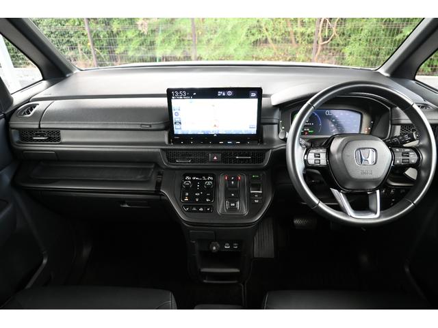 ステップワゴン e:HEVスパーダ ホンダセンシング 純正11.4INナビ Rカメラ 2.0ETC 障害物センサー シートヒーター オットマン PWゲート アルミホイール LEDライト 両側Pスライドドア ホンダコネクト 1オーナー(11枚目)