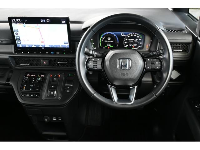 ステップワゴン e:HEVスパーダ ホンダセンシング 純正11.4INナビ Rカメラ 2.0ETC 障害物センサー シートヒーター オットマン PWゲート アルミホイール LEDライト 両側Pスライドドア ホンダコネクト 1オーナー(12枚目)