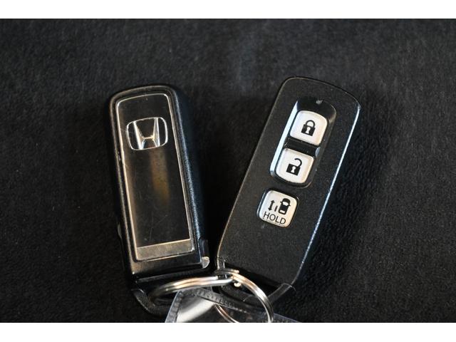 N-BOXカスタム G・Lホンダセンシング 純正8INナビ Rカメラ ETC FRドラレコ アルミホイール LEDライト 左PWスライドドア 左フロント部損傷あり 地デジTV 整備記録簿 助手席エアバッグ キーレス アイドリングST リアカメラ(17枚目)