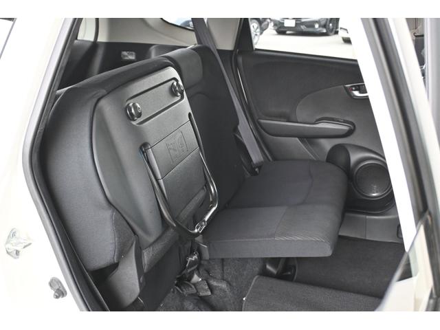 フィットハイブリッド ナビプレミアムセレクション 純正ナビ ワンセグ Rカメラ ETC シートヒーター アルミホイール HIDライト 記録簿 エアコン 運転席エアバッグ DVD再生 キーフリー パワーウィンドウ Bカメラ クルーズコントロール ABS(18枚目)