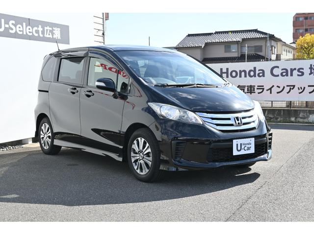 フリード Gエアロ 純正ナビ ワンセグ Rカメラ ETC アルミホイール HIDライト左PWスライドドア 助手席エアバッグ 1セグ 盗難防止 インテリキー 1オーナー車 キーレスエントリ エアバック パワーステアリング(6枚目)