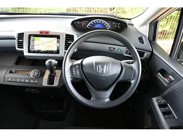 フリード Gエアロ 純正ナビ ワンセグ Rカメラ ETC アルミホイール HIDライト左PWスライドドア 助手席エアバッグ 1セグ 盗難防止 インテリキー 1オーナー車 キーレスエントリ エアバック パワーステアリング(11枚目)