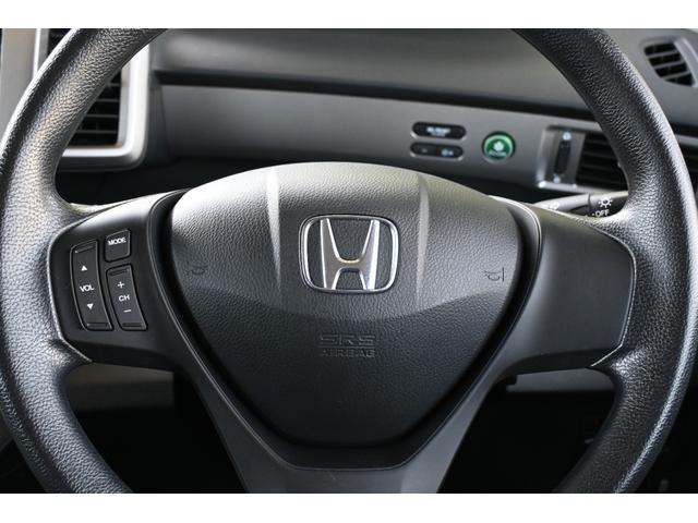 フリード Gエアロ 純正ナビ ワンセグ Rカメラ ETC アルミホイール HIDライト左PWスライドドア 助手席エアバッグ 1セグ 盗難防止 インテリキー 1オーナー車 キーレスエントリ エアバック パワーステアリング(12枚目)