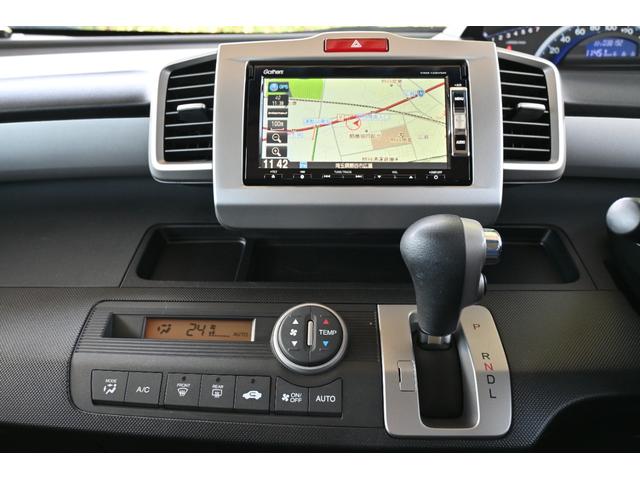 フリード Gエアロ 純正ナビ ワンセグ Rカメラ ETC アルミホイール HIDライト左PWスライドドア 助手席エアバッグ 1セグ 盗難防止 インテリキー 1オーナー車 キーレスエントリ エアバック パワーステアリング(13枚目)