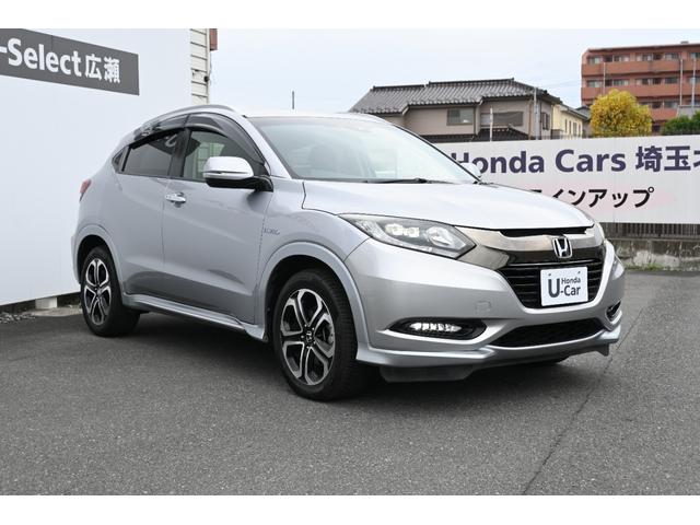 ヴェゼル ハイブリッドZ・ホンダセンシング 純正ナビ フルセグ Rカメラ ETC 革シート PWシート シートヒーター アルミホイール LEDライト 整備記録簿 横滑防止装置 バックガイドモニター シートH USB ナビTV AC ABS(6枚目)