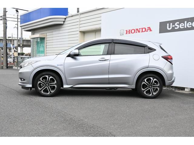 ヴェゼル ハイブリッドZ・ホンダセンシング 純正ナビ フルセグ Rカメラ ETC 革シート PWシート シートヒーター アルミホイール LEDライト 整備記録簿 横滑防止装置 バックガイドモニター シートH USB ナビTV AC ABS(7枚目)