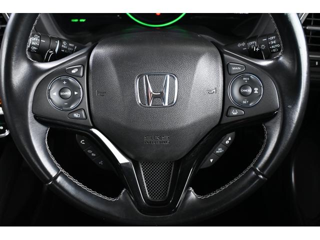 ヴェゼル ハイブリッドZ・ホンダセンシング 純正ナビ フルセグ Rカメラ ETC 革シート PWシート シートヒーター アルミホイール LEDライト 整備記録簿 横滑防止装置 バックガイドモニター シートH USB ナビTV AC ABS(12枚目)