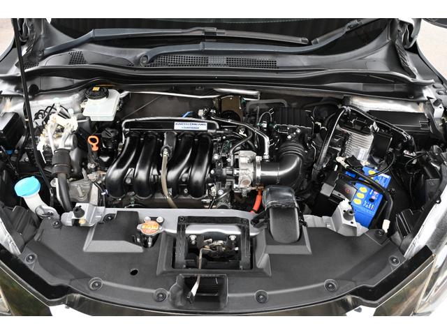 ヴェゼル ハイブリッドZ・ホンダセンシング 純正ナビ フルセグ Rカメラ ETC 革シート PWシート シートヒーター アルミホイール LEDライト 整備記録簿 横滑防止装置 バックガイドモニター シートH USB ナビTV AC ABS(25枚目)