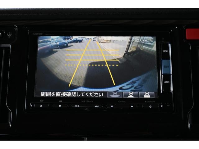 Ｎ－ＷＧＮカスタム Ｇ・Ａパッケージ　追突軽減ブレーキ　純正ナビ　フルセグ　Ｒカメラ　ＥＴＣ　アルミホイール　ＨＩＤライト　追突被害軽減ブレーキ　ＡＵＴＯエアコン　地デジ　記録簿有　助手席エアバック　ＡＢＳ　パワーウィンドウ　横滑り防止（3枚目）