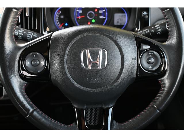 Ｎ－ＷＧＮカスタム Ｇ・Ａパッケージ　追突軽減ブレーキ　純正ナビ　フルセグ　Ｒカメラ　ＥＴＣ　アルミホイール　ＨＩＤライト　追突被害軽減ブレーキ　ＡＵＴＯエアコン　地デジ　記録簿有　助手席エアバック　ＡＢＳ　パワーウィンドウ　横滑り防止（12枚目）