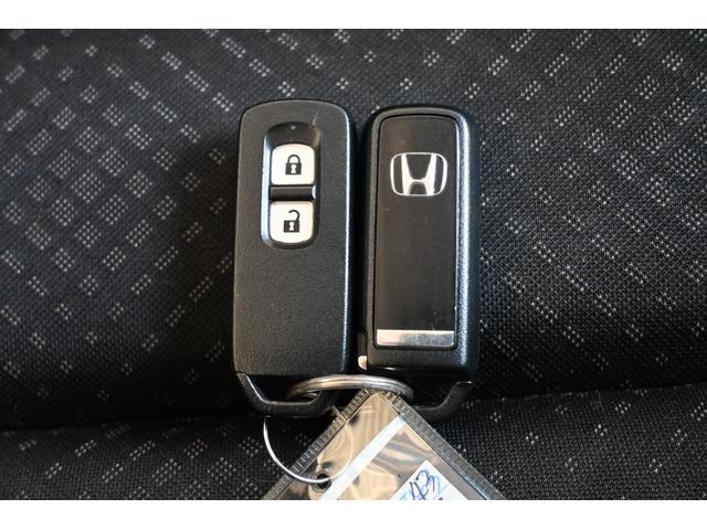 Ｎ－ＷＧＮカスタム Ｇ・Ａパッケージ　追突軽減ブレーキ　純正ナビ　フルセグ　Ｒカメラ　ＥＴＣ　アルミホイール　ＨＩＤライト　追突被害軽減ブレーキ　ＡＵＴＯエアコン　地デジ　記録簿有　助手席エアバック　ＡＢＳ　パワーウィンドウ　横滑り防止（15枚目）