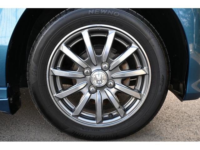 Ｎ－ＷＧＮカスタム Ｇ・Ａパッケージ　追突軽減ブレーキ　純正ナビ　フルセグ　Ｒカメラ　ＥＴＣ　アルミホイール　ＨＩＤライト　追突被害軽減ブレーキ　ＡＵＴＯエアコン　地デジ　記録簿有　助手席エアバック　ＡＢＳ　パワーウィンドウ　横滑り防止（22枚目）