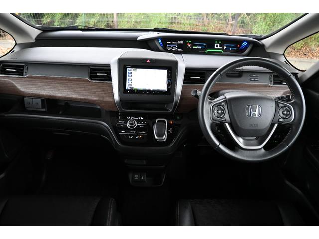 フリード＋ハイブリッド ハイブリッド・クロスターホンダセンシング　純正ナビ　フルセグ　Ｒカメラ　ＥＴＣ　シートヒーター　アルミホイール　ＬＥＤライト　ハンズフリースライドドア　両側Ｐスライドドア　バックカメラ　両側電動ドア　サイドエアバッグ　ソナー　スマートキー（11枚目）