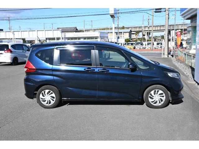 フリード Ｇ・ホンダセンシング　純正９ＩＮナビ　Ｒモニター　Ｒカメラ　ＥＴＣ　ＦＲドラレコ　シートヒーター　両側Ｐスライドドア　Ｆセグ　追突被害軽減ブレーキ　ｉストップ　Ｗエアバッグ　パワーウィンドウ　１オ－ナ－　スマートキ　ＶＳＡ（9枚目）