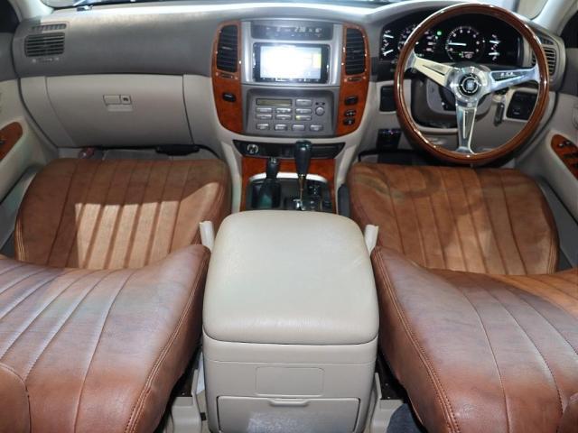 ランドクルーザー１００ ＶＸリミテッド　Ｇセレクション　再販７０純正ブルー　グレードＧセレクション　サンルーフ　丸目ヘッドライト換装　ＤＥＡＮ　カリフォルニアホイール　オープンカントリー２３５／８５／１６ＭＴ　ｃａｒｒｏｚｚｅｒｉａ７インチフルセグナビ搭載（5枚目）