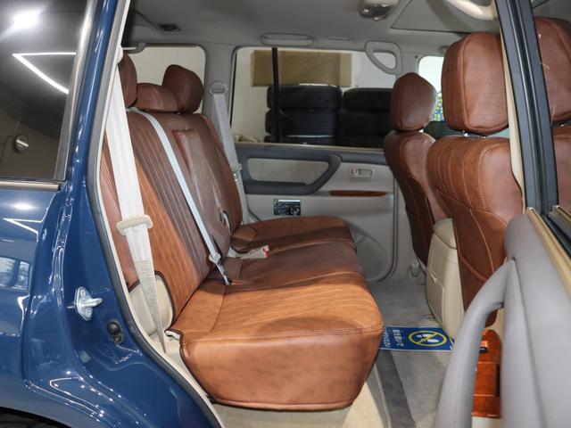 ランドクルーザー１００ ＶＸリミテッド　Ｇセレクション　再販７０純正ブルー　グレードＧセレクション　サンルーフ　丸目ヘッドライト換装　ＤＥＡＮ　カリフォルニアホイール　オープンカントリー２３５／８５／１６ＭＴ　ｃａｒｒｏｚｚｅｒｉａ７インチフルセグナビ搭載（9枚目）