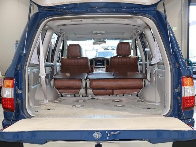 ランドクルーザー１００ ＶＸリミテッド　Ｇセレクション　再販７０純正ブルー　グレードＧセレクション　サンルーフ　丸目ヘッドライト換装　ＤＥＡＮ　カリフォルニアホイール　オープンカントリー２３５／８５／１６ＭＴ　ｃａｒｒｏｚｚｅｒｉａ７インチフルセグナビ搭載（10枚目）