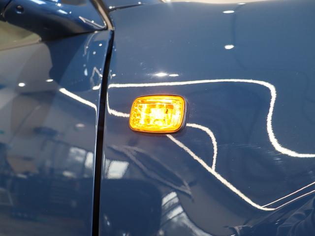 ランドクルーザー１００ ＶＸリミテッド　Ｇセレクション　再販７０純正ブルー　グレードＧセレクション　サンルーフ　丸目ヘッドライト換装　ＤＥＡＮ　カリフォルニアホイール　オープンカントリー２３５／８５／１６ＭＴ　ｃａｒｒｏｚｚｅｒｉａ７インチフルセグナビ搭載（26枚目）