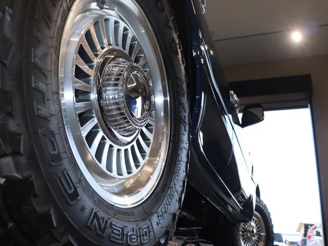 ランドクルーザー１００ ＶＸリミテッド　Ｇセレクション　再販７０純正ブルー　グレードＧセレクション　サンルーフ　丸目ヘッドライト換装　ＤＥＡＮ　カリフォルニアホイール　オープンカントリー２３５／８５／１６ＭＴ　ｃａｒｒｏｚｚｅｒｉａ７インチフルセグナビ搭載（37枚目）