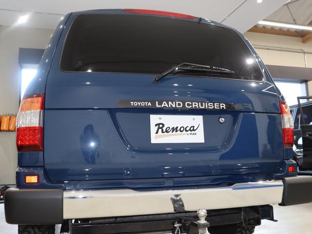 ランドクルーザー１００ ＶＸリミテッド　Ｇセレクション　再販７０純正ブルー　グレードＧセレクション　サンルーフ　丸目ヘッドライト換装　ＤＥＡＮ　カリフォルニアホイール　オープンカントリー２３５／８５／１６ＭＴ　ｃａｒｒｏｚｚｅｒｉａ７インチフルセグナビ搭載（39枚目）