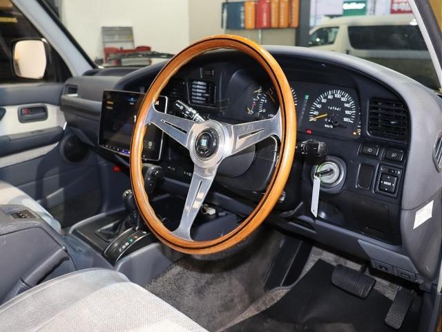 ランドクルーザー80 VXリミテッド 80sランクル系純正カラー 丸目ヘッドライト換装 TOYOTAロゴグリル DEANカルフォルニアAW OPENカントリー235MTタイヤ LC70スチールバンパー ナルディステアリング(4枚目)