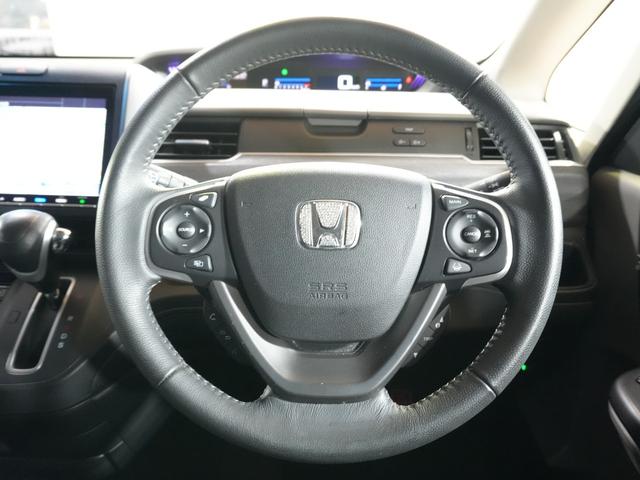 フリード G・ホンダセンシング 純正9型メモリナビ フルセグTV 純正11.6型FDモニター 黒ハーフレザーシート 本革巻きステアリング 社外15インチ 両側パワースライドドア LED ETC ホンダセンシング LKA レーダーC(8枚目)