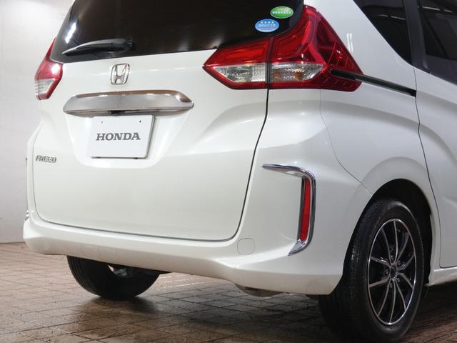 フリード G・ホンダセンシング 純正9型メモリナビ フルセグTV 純正11.6型FDモニター 黒ハーフレザーシート 本革巻きステアリング 社外15インチ 両側パワースライドドア LED ETC ホンダセンシング LKA レーダーC(69枚目)