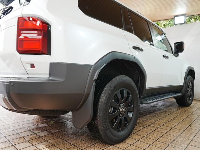 ランドクルーザー250 VXファーストエディション 丸目ヘッドライト トヨタチームメイト サンルーフ 全方位カメラ デジタルインナーミラー 茶革シート シートヒーター・ベンチレーション 純正マット 前後ドラレコ 社外セキュリティ(イグラ)(63枚目)