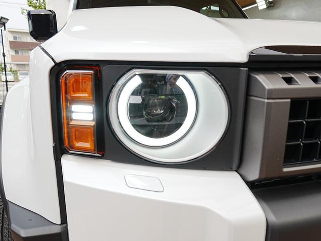 ランドクルーザー250 VXファーストエディション 丸目ヘッドライト トヨタチームメイト サンルーフ 全方位カメラ デジタルインナーミラー 茶革シート シートヒーター・ベンチレーション 純正マット 前後ドラレコ 社外セキュリティ(イグラ)(67枚目)